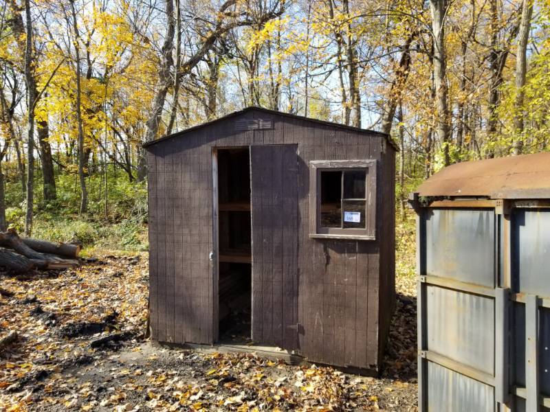 lot 168 image: Wood Board Storage Shed with Racking