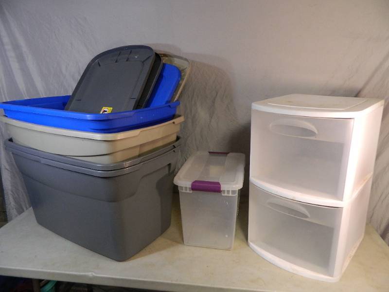 lot 100 image: 4 Large Totes with Lids, 2 Drawer Organizer, and More