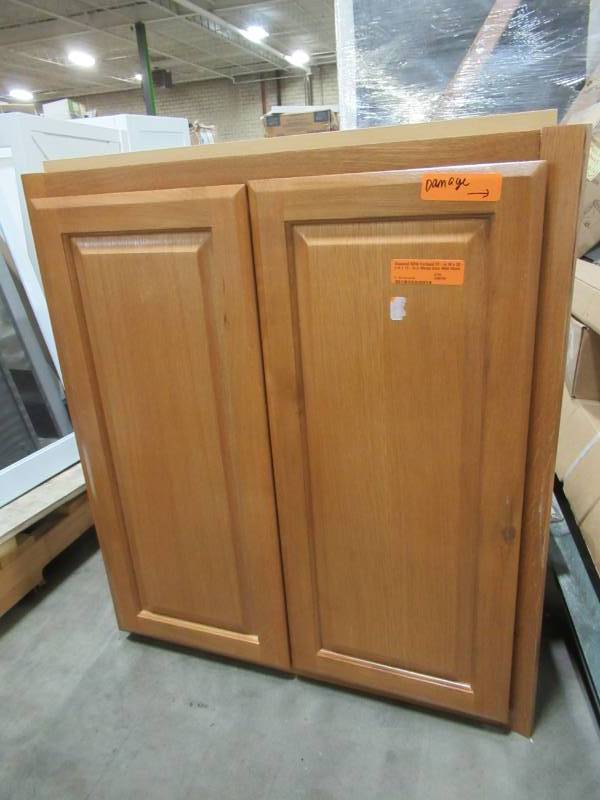 lot 249 image: Diamond NOW Portland 27-in W x 30-in H x 12-in D Wheat Door Wall Stock Cabinet 22 W2730B - Damage Front and Back RH Side.