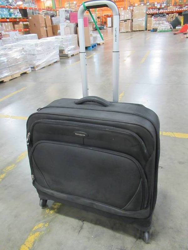 lot 261 image: Samsonite Spinner Suitcase Measures Approximately 23 X 10 X 22 Tall - In nice condition.