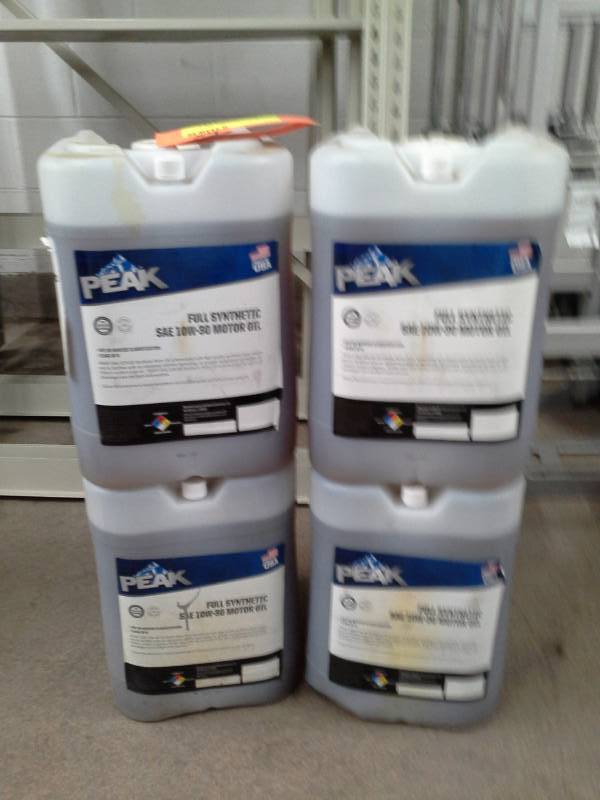 lot 169 image: 4 Jugs of Peak Full Synthetic Motor Oil 10W-30 5-Gallon