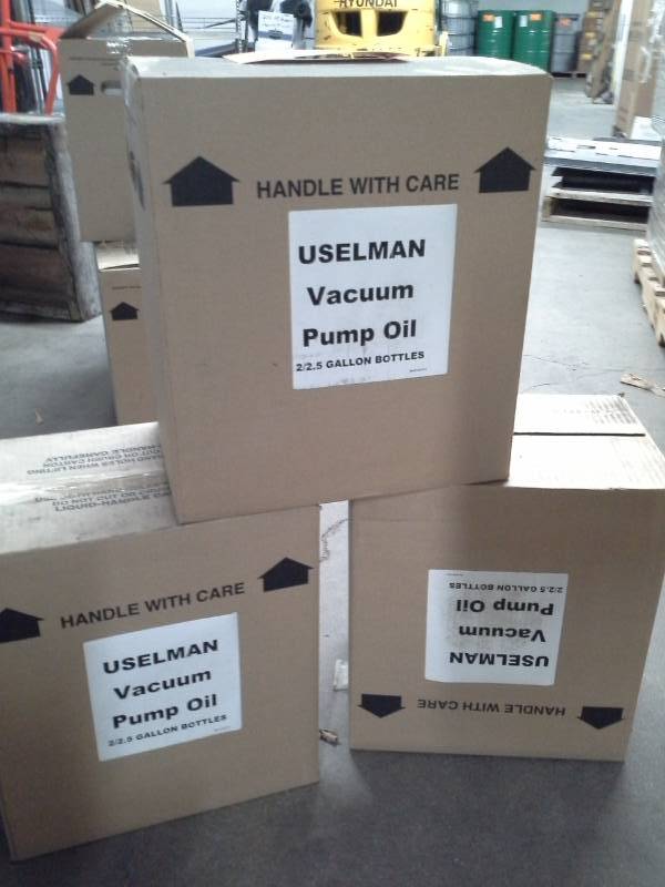 lot 238 image: 3 Cases of Uselman Vacuum Pump Oil 2.5-Gallon Bottles