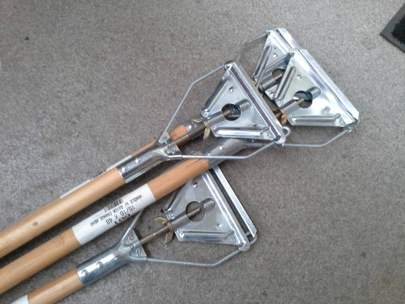 lot 378 image: Lot of (4)  1516x48in. Mop Wood Handle with Quick Change Head 601