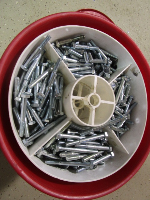 lot 329 image: LARGE BUCKET ORGANIZER FILLED WITH NUTS AND BOLTS
