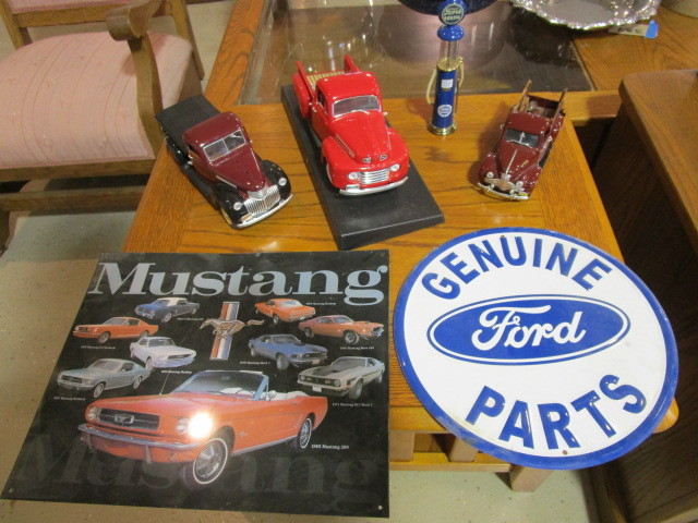 lot 386 image: TERRY REDLIN STUDEBAKER, FORD SIGNS, GAS PUMP, MORE