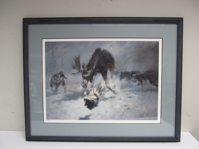 lot 34 image: Framed Signed & Numbered Wolves Attacking Moose Print by Manfred Schatz - Challenged