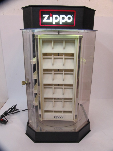 lot 209 image: Nice Working Spinning Lighted ZIPPO Cigarette Lighter Advertising Display Case