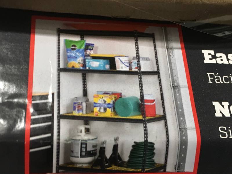 lot 55 image: Muscle Rack 44 in. W x 72 in. H x 24 in. D BlackYellow Steel 4-Shelf Garage Shelving Unit not used