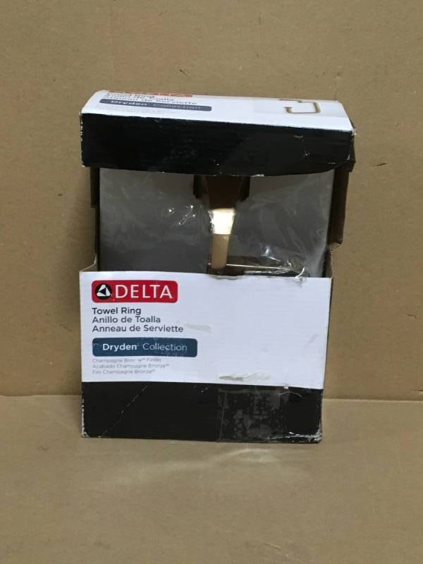 lot 85 image: Delta Dryden Open Towel Ring in Champagne Bronze Model#  75146-CZ not used