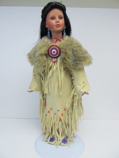 lot 18 image: Limited Edition Hand Numbered Native American Porcelain Doll