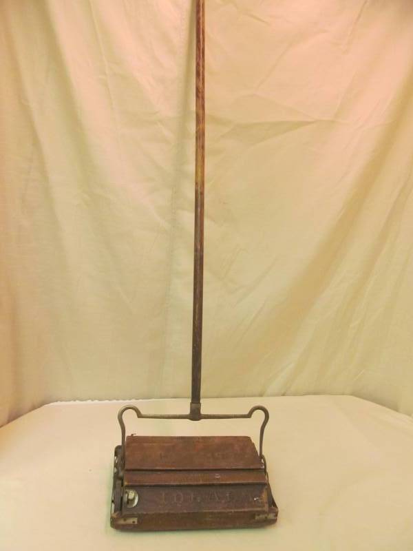 lot 20 image: Antique Bissell carpet broom