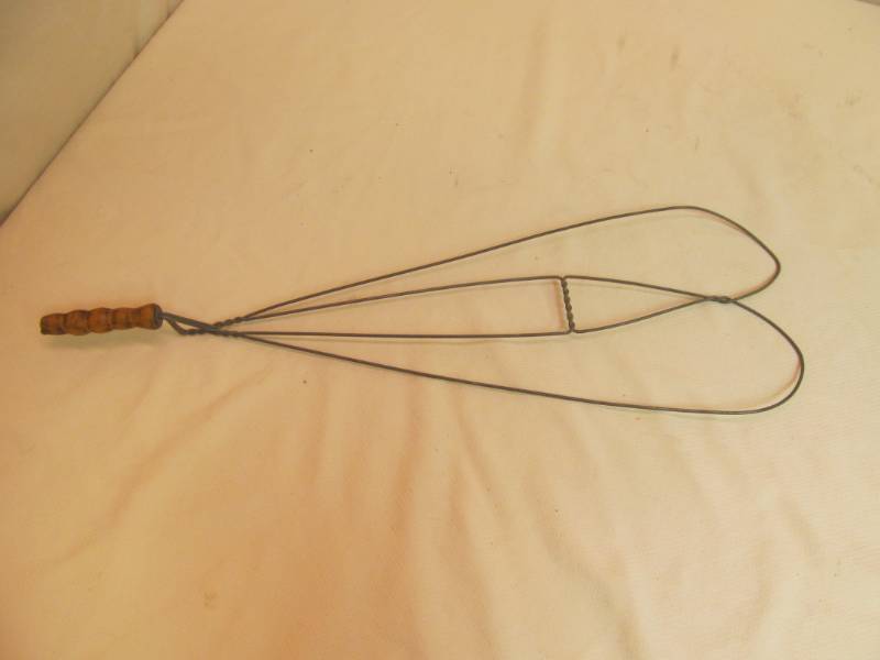 lot 38 image: vintage rug beater