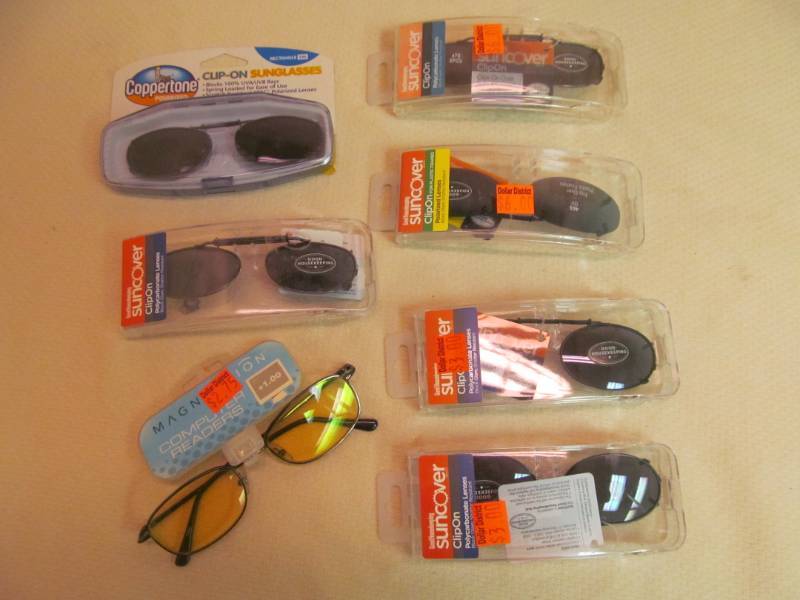 lot 77 image: clip on sunglasses