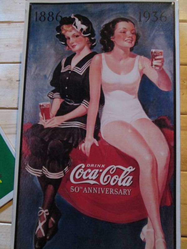 lot 18 image: Coca Cola tin sign 50th anniversary...