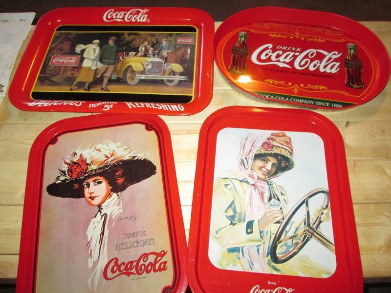 lot 23 image: Lot of 4 Coca Cola Collector tins...