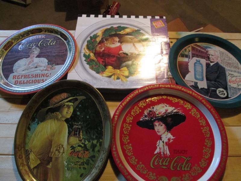 lot 36 image: 4 Coca Cola tins and a platter in o...