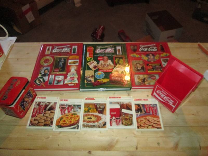 lot 42 image: Coca Cola collector guides and reci...