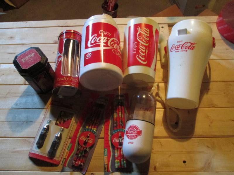 lot 43 image: Coca Cola drinkware, pencils, magne...