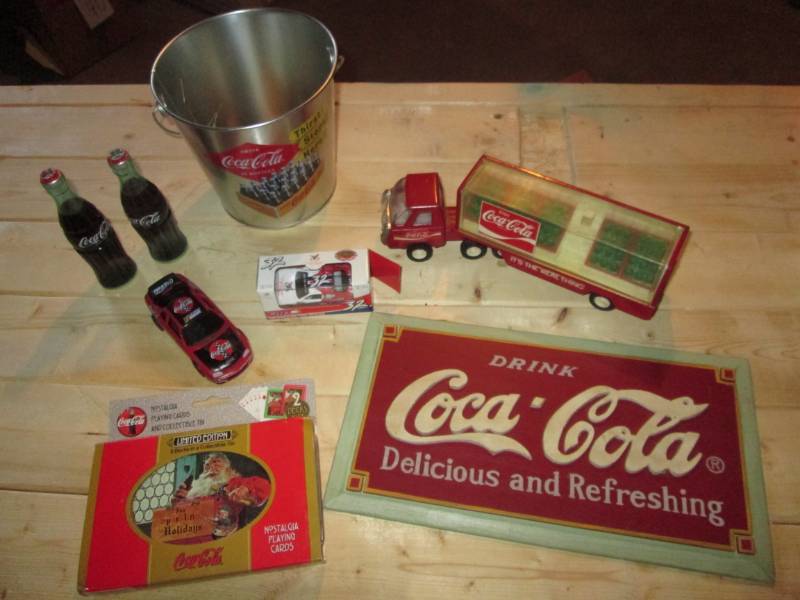 lot 44 image: Coca Cola truck, signs, playing car...