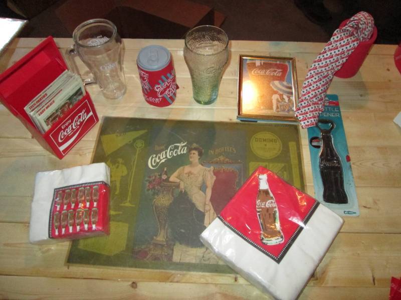lot 45 image: Coca Cola dining lot includes Napki...