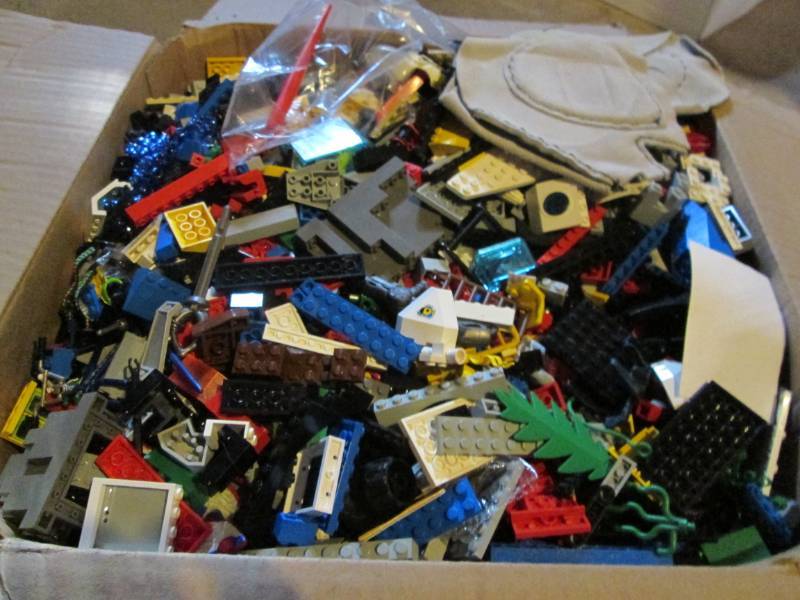 lot 69 image: Legos and leatherwork...