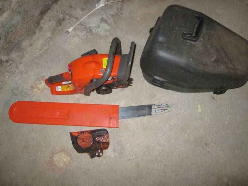 lot 83 image: Husquervana chain saw...