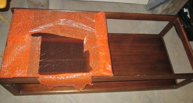 lot 90 image: Glass top coffee table op is 22 x 5...