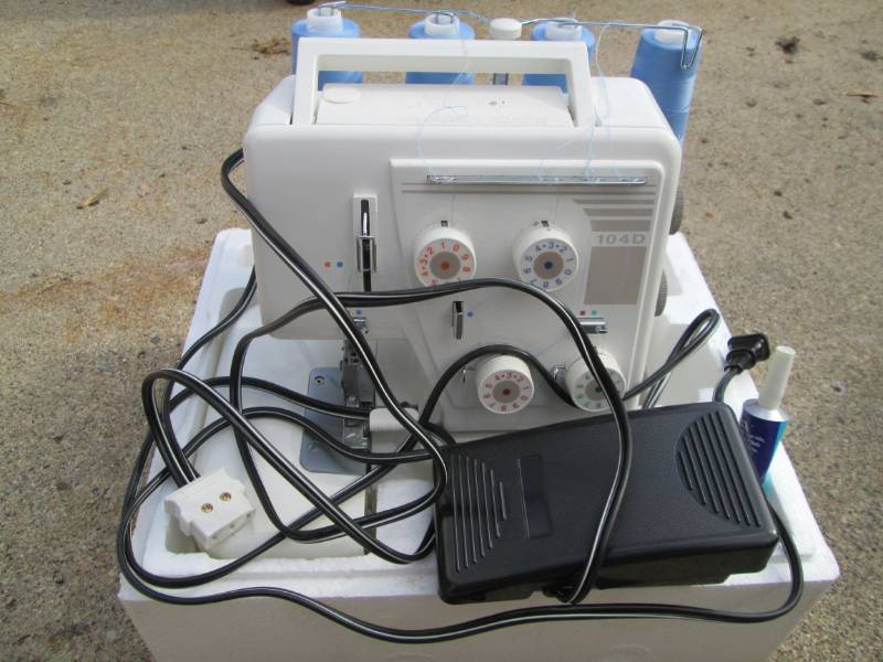 lot 97 image: New HomeSerger 104D machine...
