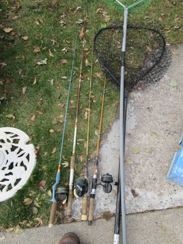 lot 107 image: 4 Vintage fishing poles and 2 nets...