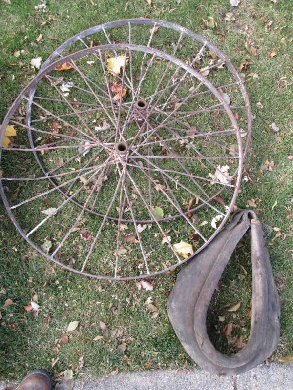 lot 112 image: 2 metal wagon wheels and a horse co...