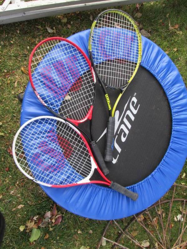 lot 114 image: Trampoline and 3 Wilson racquets...