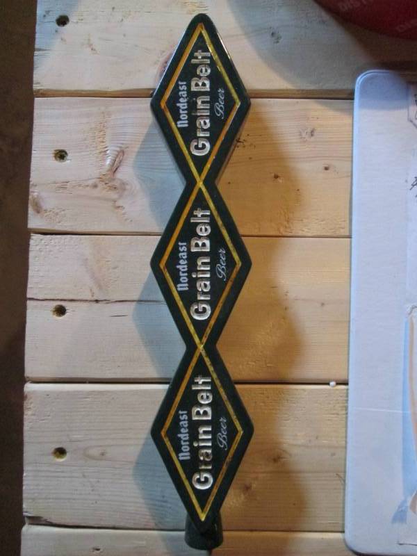 lot 136 image: Nordeast Grain Belt beer tap head...