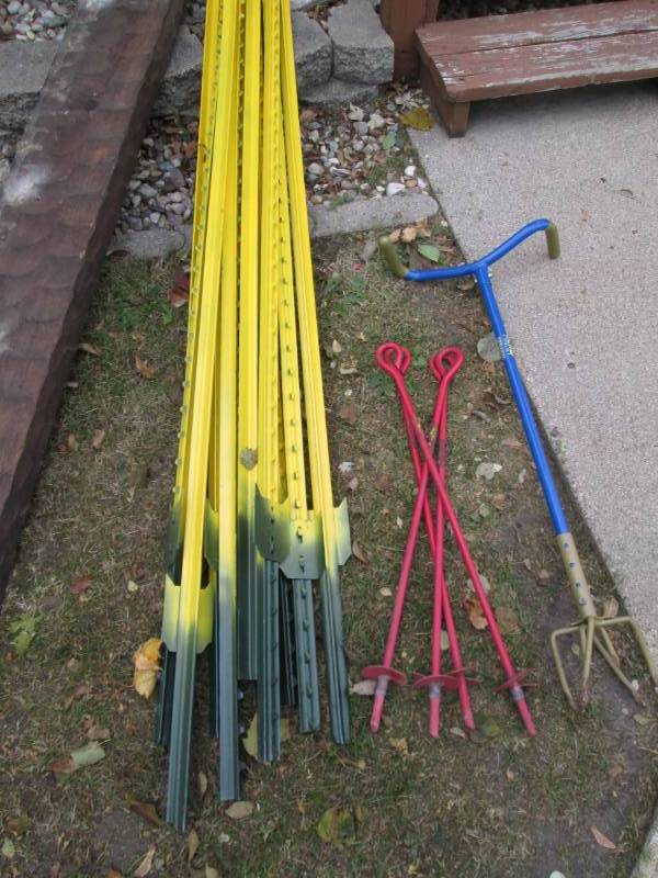 lot 164 image: Lot of posts and a post digger...