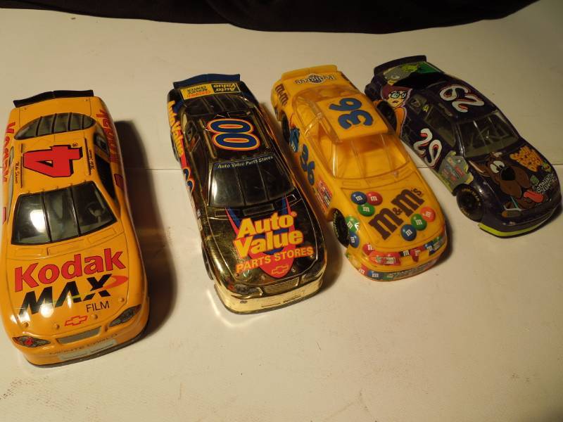 lot 112 image: 4 Nascar Cars