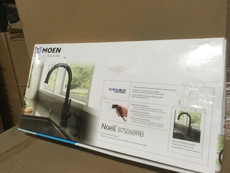 lot 143 image: MOEN Noell Single-Handle Standard Kitchen Faucet with Side Sprayer in Mediterranean Bronze- good condition