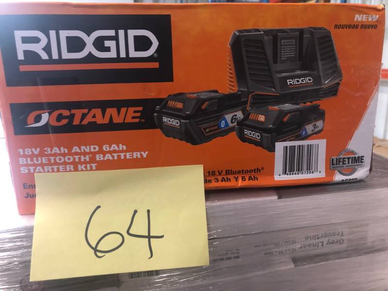 lot 64 image: RIDGID 18-Volt OCTANE Lithium-Ion Bluetooth 3.0 Ah and 6.0 Ah Battery Starter Kit with Charger- open box