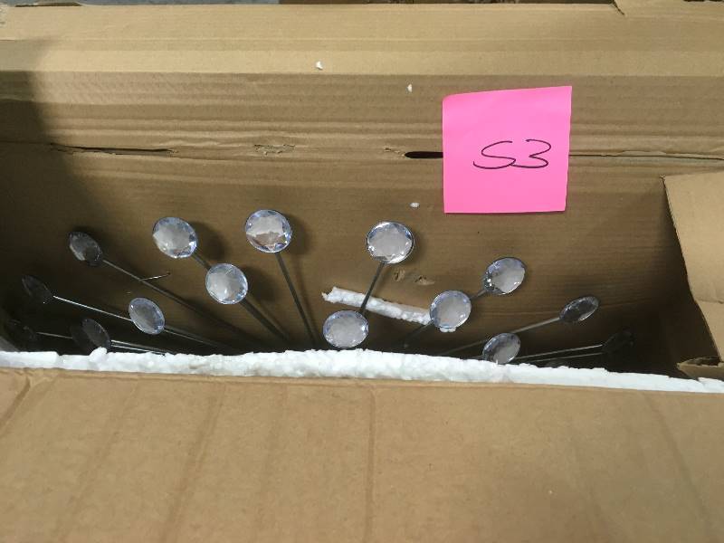 lot 53 image: Stratton Home Decor 24 in. Silver Acrylic Burst Wall Decor by Stratton Home Decor- good condition