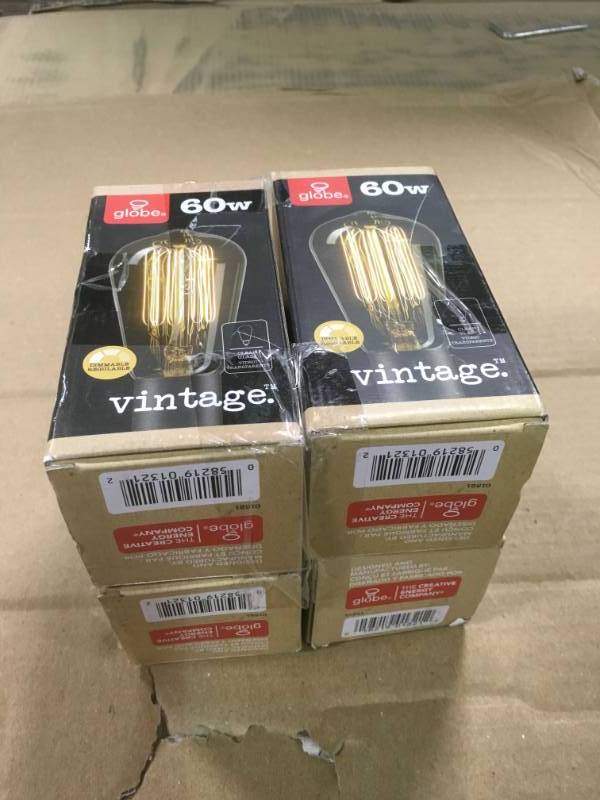 lot 68 image: (Lot of 4) Globe Electric 60-Watt Incandescent S60 Vintage Squirrel Cage Medium Base Light Bulb- not used
