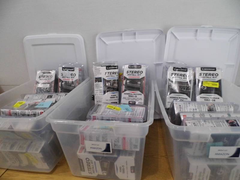 lot 91 image: 3 Totes w Stereo Install Kits