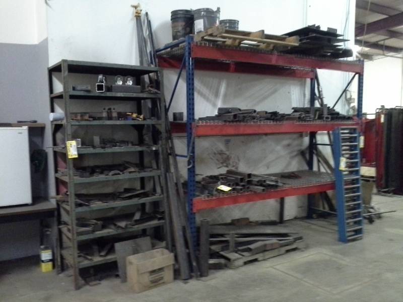 lot 52 image: Contents of Shelves - Metal BracketsPosts, Wood Pallet, Buckets, And More