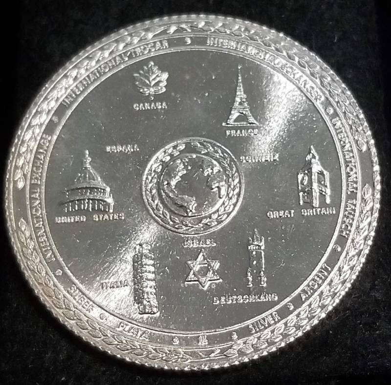 lot 07 image: 1 TROY OZ. .999 FINE SILVER VINTAGE WORLD COMMERCE & TRADE ROUND