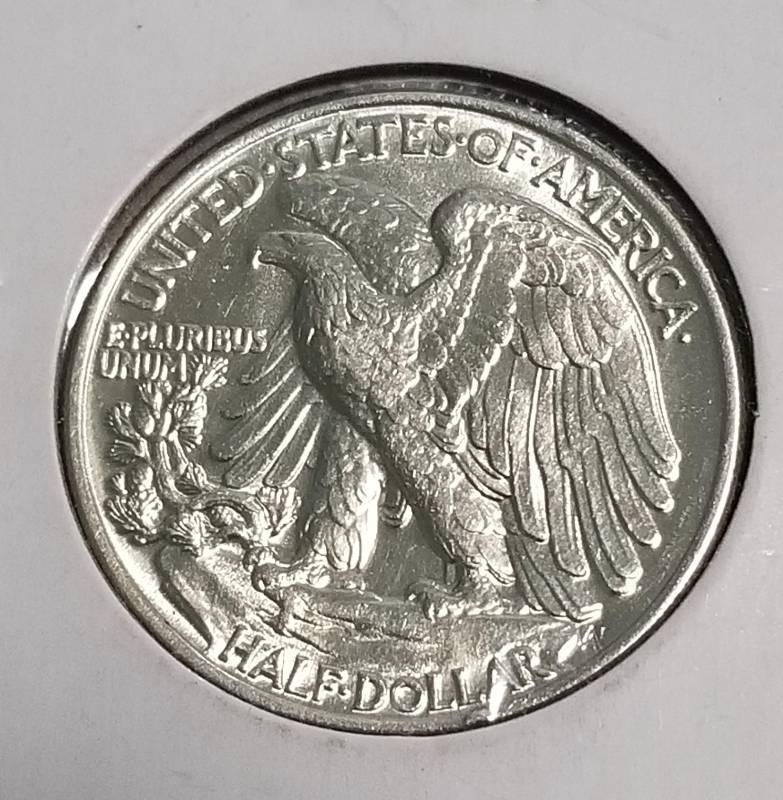 lot 14 image: 1946 WALKING LIBERTY HALF DOLLAR BU