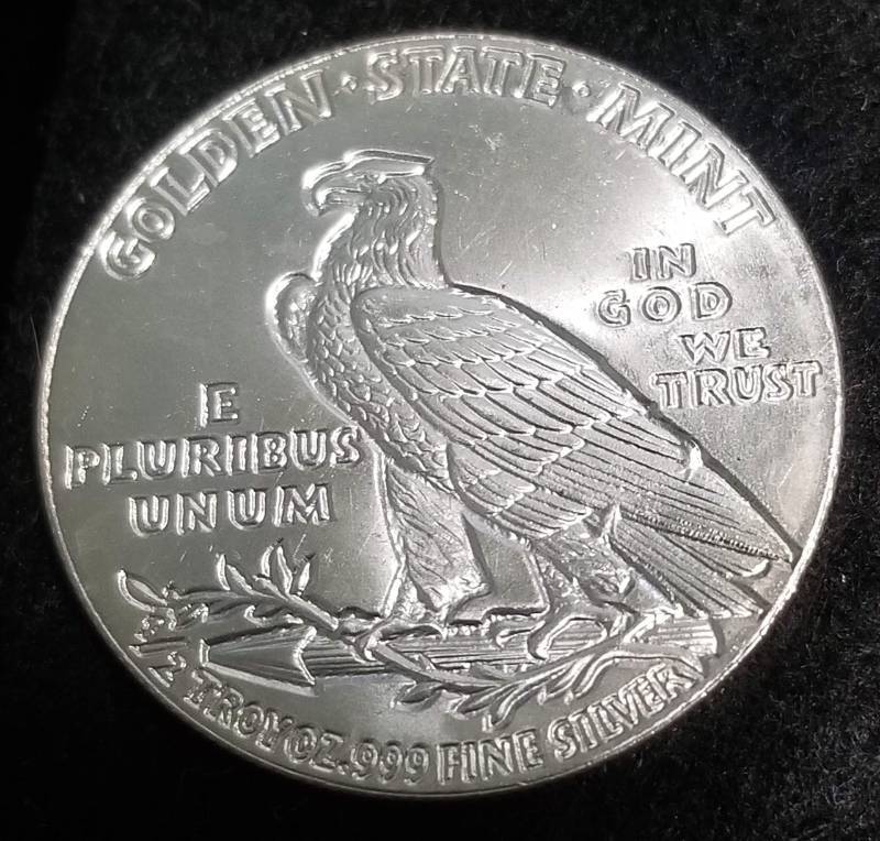 lot 19 image: 12 TROY OZ. .999 FINE SILVER INCUSE INDIAN DESIGN