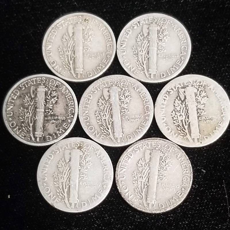 lot 33 image: GROUP OF 7 MERCURY DIMES AS PICTURED