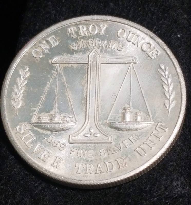 lot 58 image: 1 TROY OZ. .999 FINE SILVER EAGLE WITH FLAG TRADE UNIT
