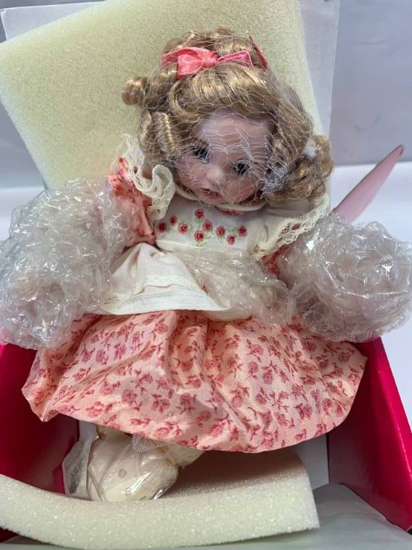 lot 22 image: Marie Osmond Baby Darling Rosebud Porcelain Doll $59 Retail