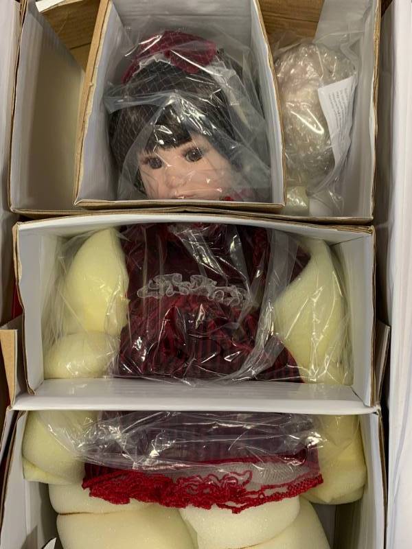 lot 51 image: Marie Osmond Red Velvet Porcelain 18 Doll $99 Retail