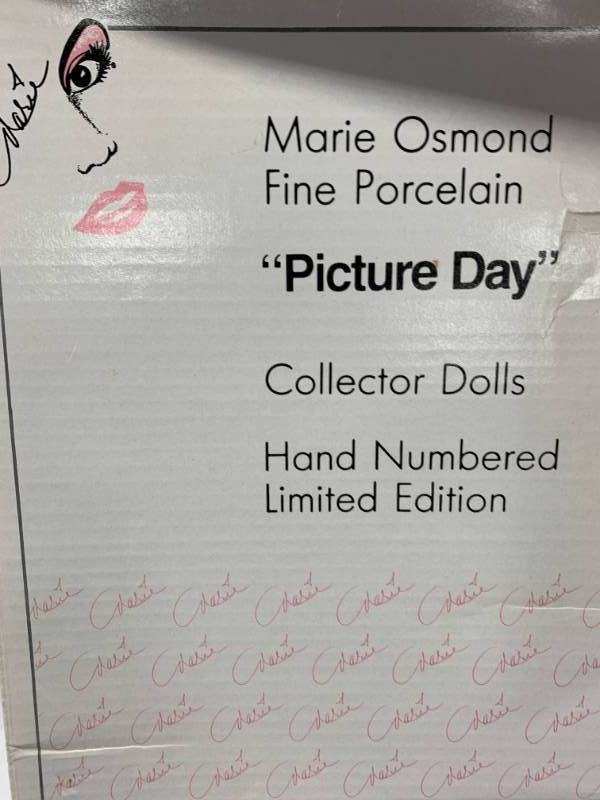 lot 53 image: Marie Osmond Baby Alexis Picture Day Porcelain 19Doll $199 Retail