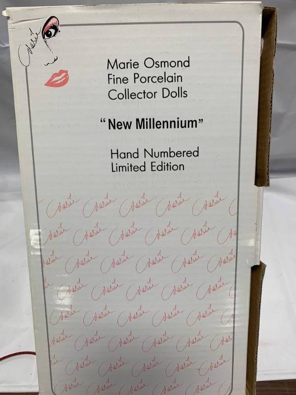 lot 57 image: Marie Osmond New Millennium Angel Baby Porcelain 15 Doll $139 Retail