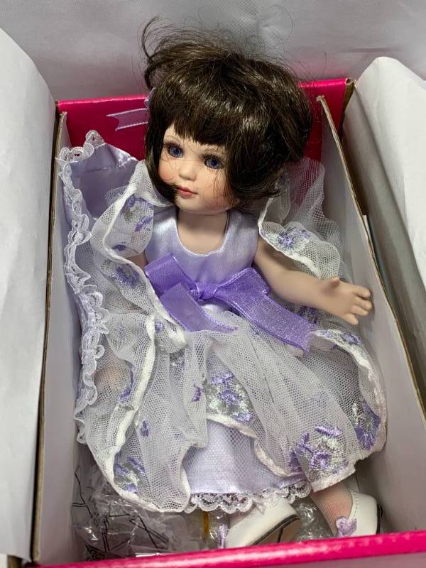 lot 59 image: Marie Osmond Caterpillars to Butterflies Porcelain 8 Doll $175 Retail